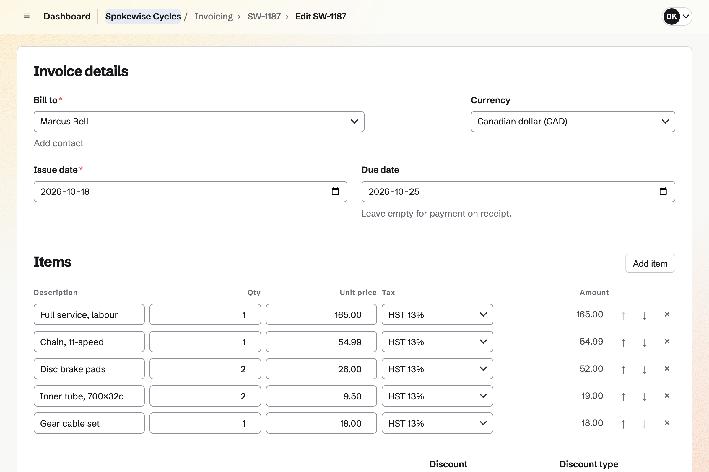 A Spokewise Cycles repair invoice open in the invoice editor for Marcus Bell: a line for the full service’s labour and one for each part fitted, a chain, brake pads, inner tubes and a gear cable, each with 13% HST.
