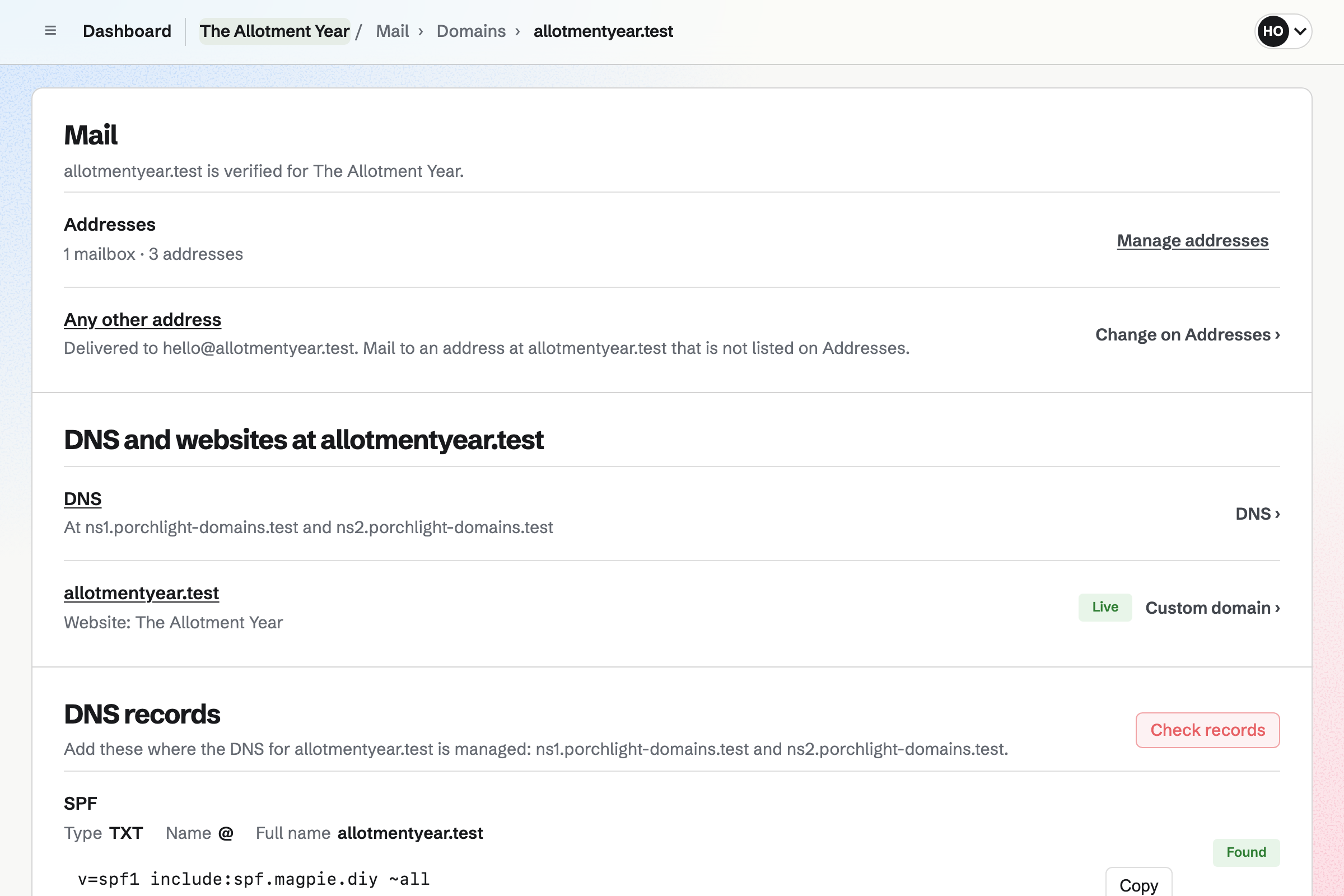 The Allotment Year’s domain allotmentyear.test in Mail: verified, with one mailbox and three addresses, a catch-all delivering to hello@, its DNS provider, and the website live at the domain.