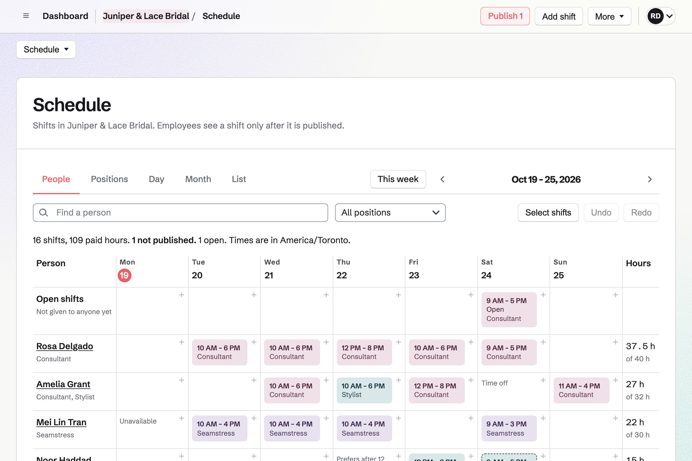 Juniper & Lace Bridal’s week in Staff Scheduling by person: an open Saturday consultant shift on the top row, then consultants, a seamstress and a stylist with their shifts by day, availability and weekly hours.