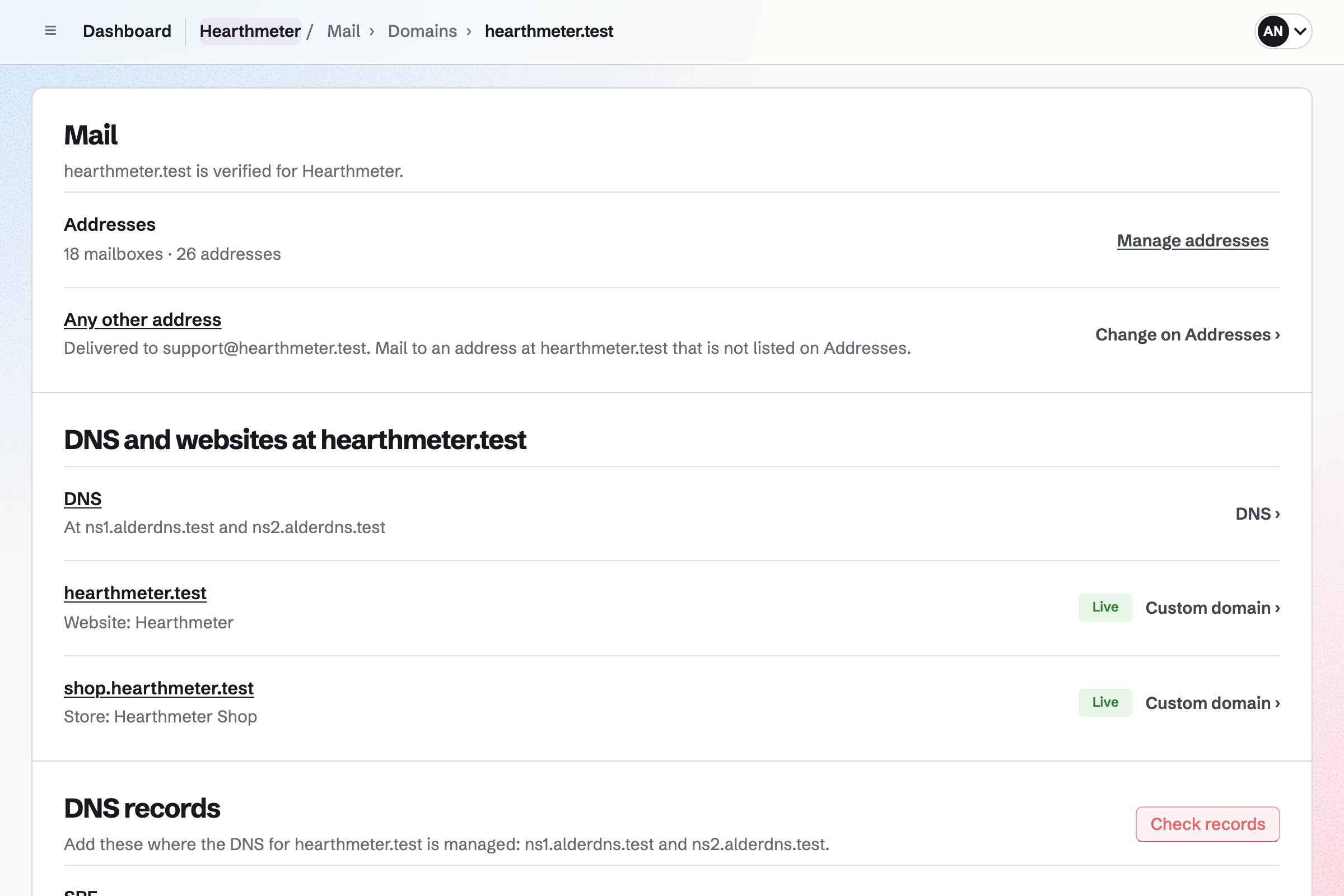 Hearthmeter’s domain hearthmeter.test in Mail: verified, with 18 mailboxes and 26 addresses, mail to any other address delivered to support@hearthmeter.test, and the website and the shop live at the domain.