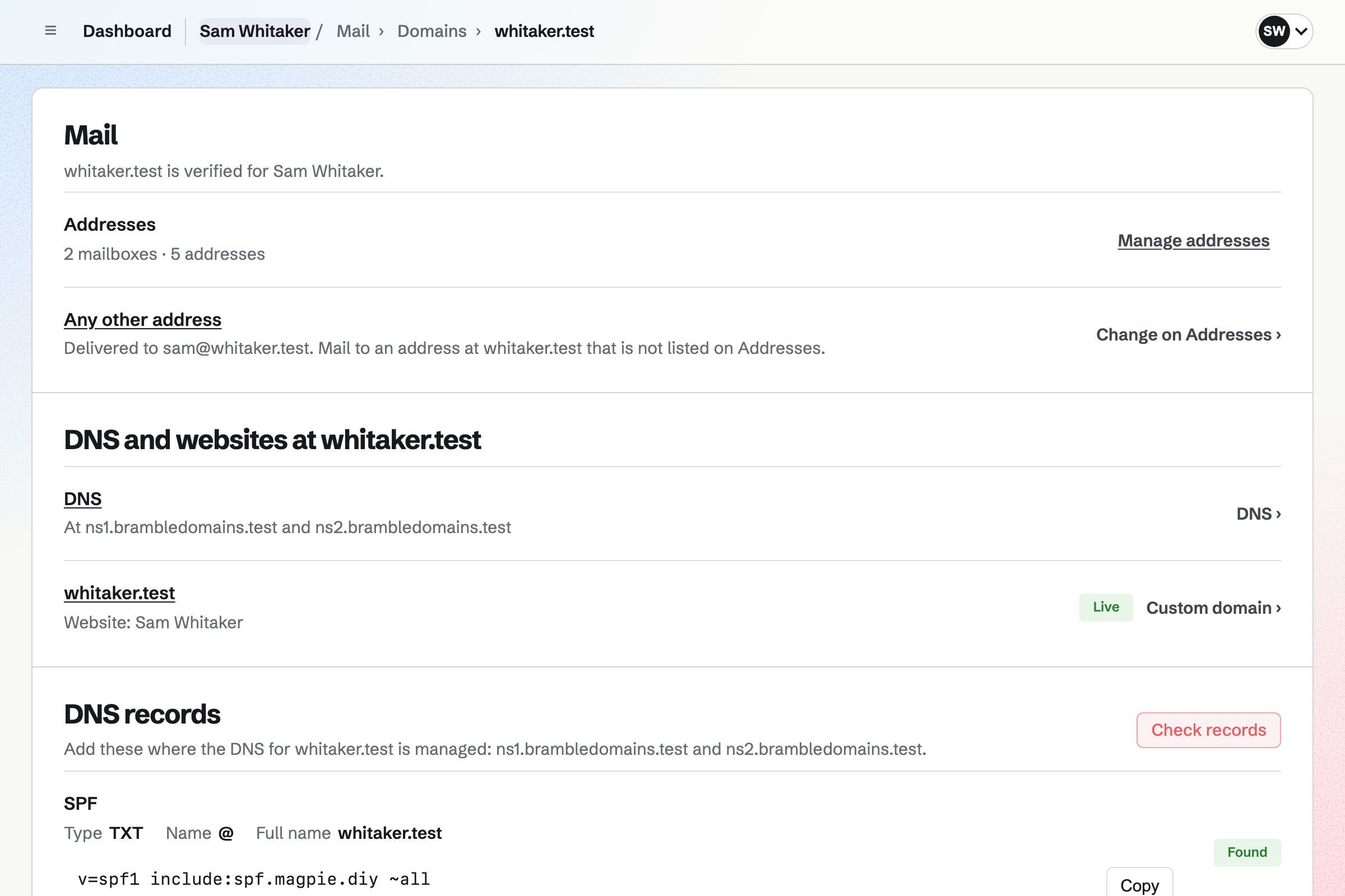 Sam Whitaker’s domain, whitaker.test, verified in Mail with 2 mailboxes and 5 addresses and mail to any other address delivered to sam@whitaker.test, its DNS at the current provider, and Sam’s website live at the same domain.
