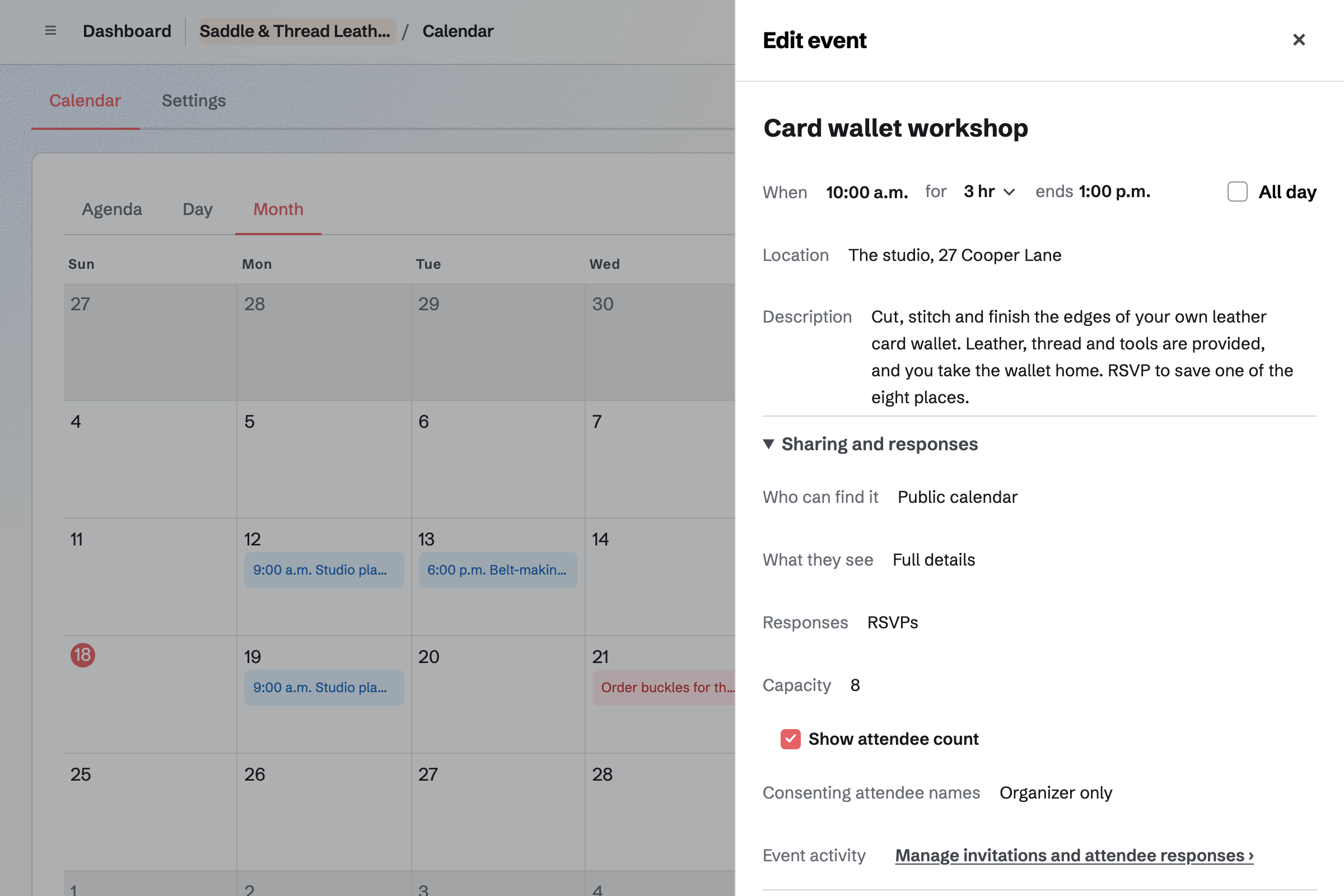 Saddle & Thread Leatherworks’ team Calendar in Month view, with the card wallet workshop open in the event drawer: on the public calendar with its full details, taking RSVPs for up to 8 people.